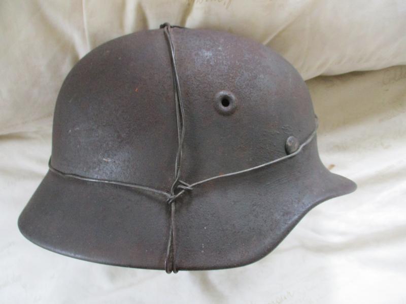 WW2 GERMAN M40 STEEL COMBAT HELMET WITH CAMO WIRE